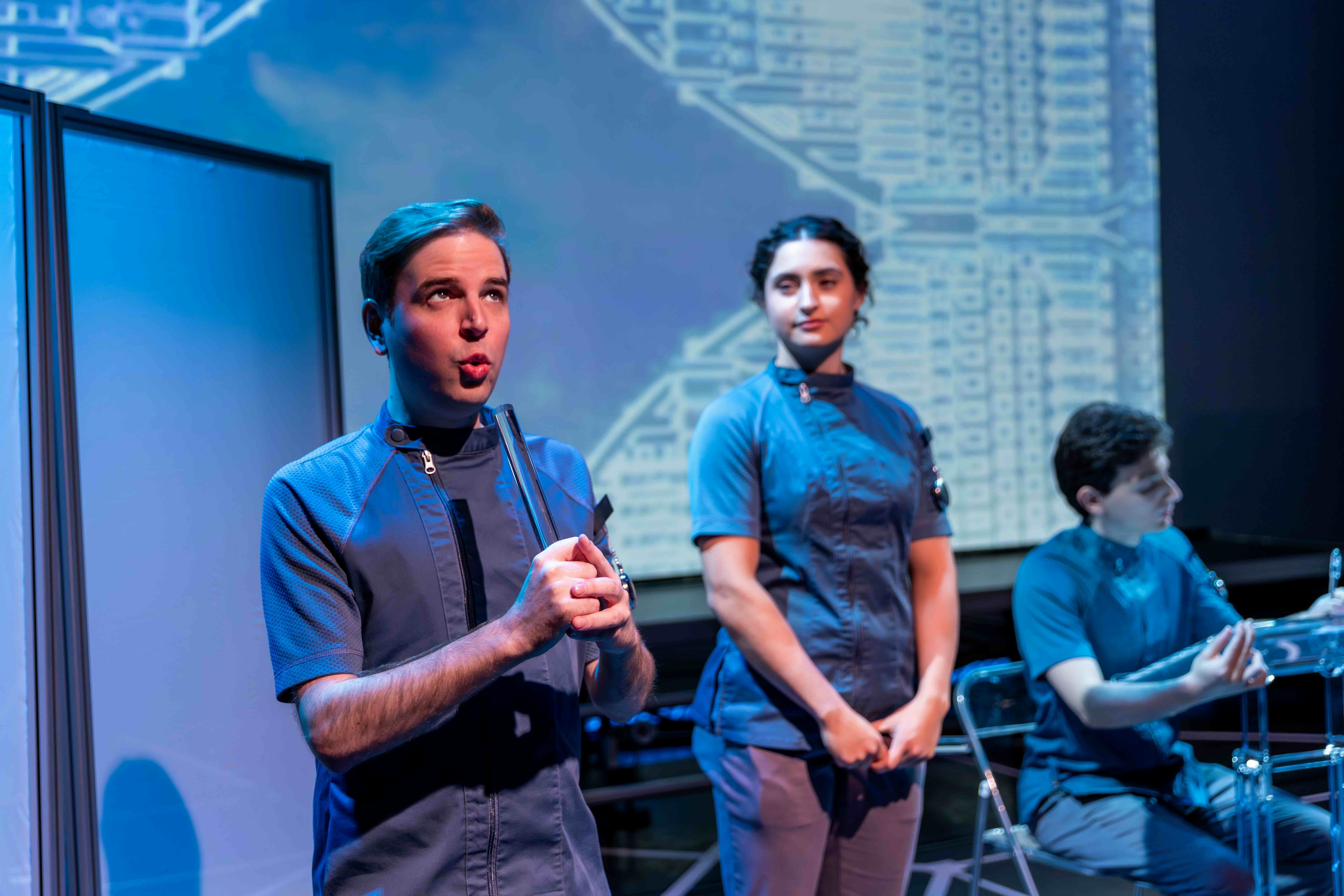  John Teresi and Rachel Fink as MEDIA, Aaron Greenberg as D-503. 