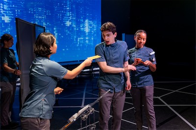 Sangita Baruah as U, Aaron Greenberg as D-503 and Cassandra Umaña as O-90
